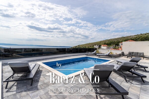 photo 4 Seget, a contemporary villa with an open sea view