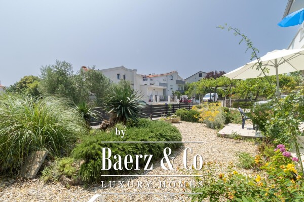 photo 13 Krk, house with three residential units and a large garden in the center