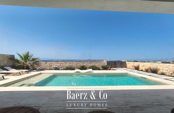 photo 1 EXCLUSIVE LUXURY VILLA ON THE FIRST LINE OF THE SEA IN CIUTADELLA, MENORCA, WITH SWIMMING POOL AND MODERN DESIGN