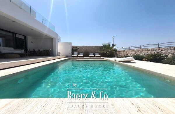 photo 4 EXCLUSIVE LUXURY VILLA ON THE FIRST LINE OF THE SEA IN CIUTADELLA, MENORCA, WITH SWIMMING POOL AND MODERN DESIGN