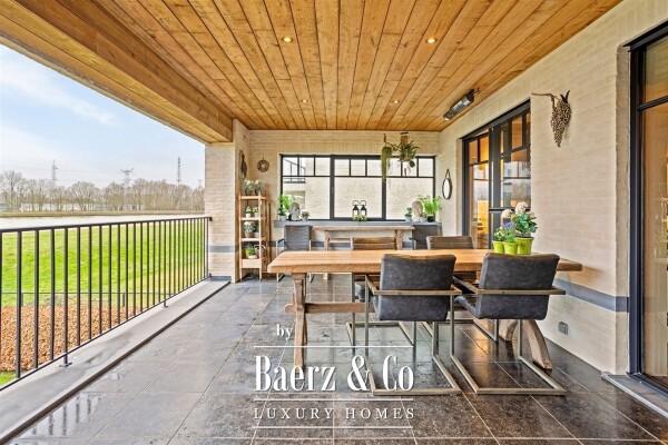 photo 19 Uitzonderlijke Duplex met zicht op kanaal, garage, carport en ruime (wijn)kelder!