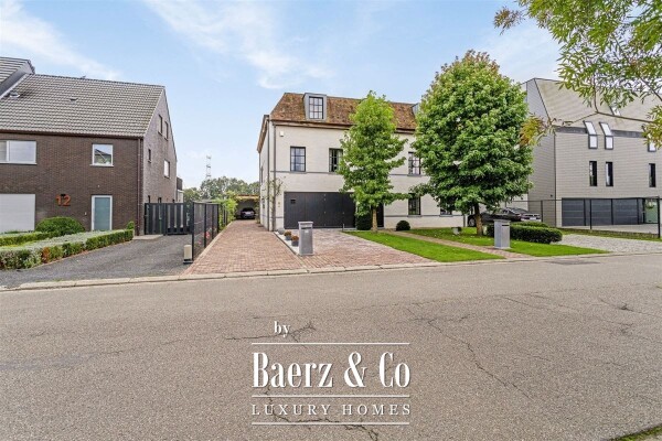 photo 7 Uitzonderlijke Duplex met zicht op kanaal, garage, carport en ruime (wijn)kelder!