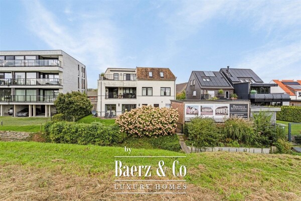 photo 39 Uitzonderlijke Duplex met zicht op kanaal, garage, carport en ruime (wijn)kelder!